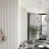 CurveFit White – valoviti fleksibilni MDF panel na zakrivljenoj površini.
